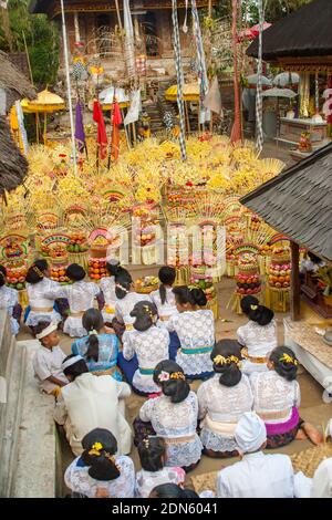 Balinese religious celebration inside a Hindu temple with decorations in Bali, Indonesia. Stock Photo