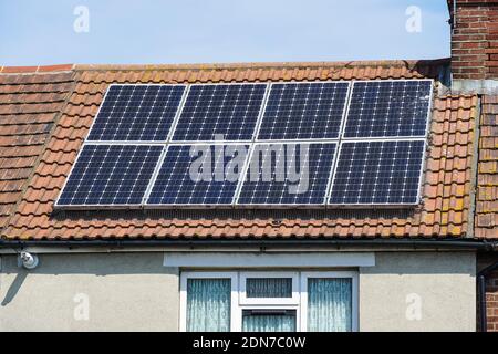 Solar panels on the roof of a house in London, England, United Kingdom, UK Stock Photo