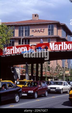 A Marlboro Cigarettes billboard on overpass in front of a Hyatt Hotel in Istanbul, Turkey Stock Photo