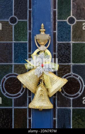 Christmas decoration on a front door, London England United Kingdom UK Stock Photo