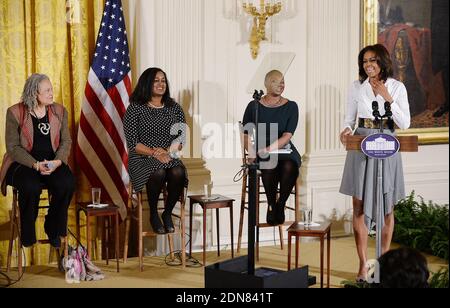 First Lady Michelle Obama delivers remarks as (L-R) Charlayne Hunter-Gault, activist and journalist, Chanelle Hardy, National Urban League Senior Vice President, Vanessa DeLuca, Editor-in-chief of Essence Magazine look on at 'Celebrating Women of the Movement', an event honoring Black History Month, at the White House in Washington, DC, USA February 20, 2015. Photo by Olivier Douliery/ABACAPRESS.COM Stock Photo