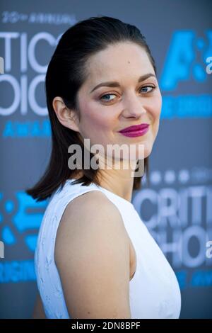 File photo : Marion Cotillard attends the 20th annual Critics' Choice Movie Awards at the Hollywood Palladium on January 15, 2015 in Los Angeles, CA, USA. Almost as soon as news broke about the divorce of Brad Pitt and Angelina Jolie, people started pointing fingers. And most were aimed at his Allied co-star Marion Cotillard. But the French actress’s friends have rushed to her defence, saying she would be “absolutely devastated” by suggestions she has any role to play in the sensational split, or that she’s been unfaithful to her partner, fellow actor Guillaume Canet, 43. Photo by Lionel Hahn/ Stock Photo