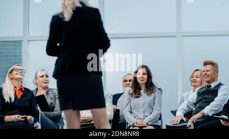 businesswoman holds a meeting with senior management . business and education Stock Photo