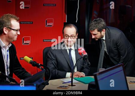 French President Francois Hollande prepares to answer reporters during a live interview on Patrick Cohen's '7/9' broadcast at France Inter radio station, in Paris, France on Monday January 5, 2015. Photo Pool by Remy de la Mauviniere/ABACAPRESS.COM Stock Photo