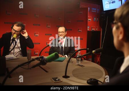 French President Francois Hollande prepares to answer reporters during a live interview on Patrick Cohen's '7/9' broadcast at France Inter radio station, in Paris, France on Monday January 5, 2015. Photo Pool by Remy de la Mauviniere/ABACAPRESS.COM Stock Photo