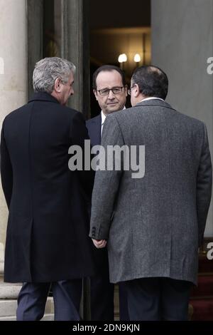 French President Francois Hollande at the Elysee Palace before attending a Unity rally ÒMarche RepublicaineÓ on January 11, 2015 in Paris in tribute to the 17 victims of a three-day killing spree by homegrown Islamists. The killings began on January 7 with an assault on the Charlie Hebdo satirical magazine in Paris that saw two brothers massacre 12 people including some of the country's best-known cartoonists, the killing of a policewoman and the storming of a Jewish supermarket on the eastern fringes of the capital which killed 4 local residents. Photo by Stephane Lemouton/ABACAPRESS.COM Stock Photo
