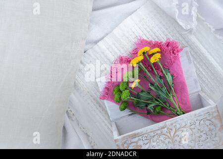 Still life of fresh orange flowers on a summer day at a picnic Stock Photo