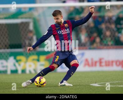 Gerard Pique FC Barcelona during the Spanish La Liga soccer match, Elche CF Vs FC Barcelona at Martinez Valero Stadium in Elche, Spain on January 24, 2015. Photo by Giuliano Bevilacqua/ABACAPRESS.COM Stock Photo