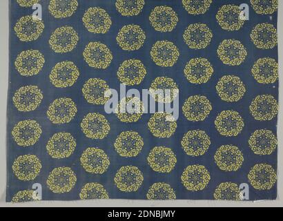 Textile, Medium: cotton Technique: resist or discharge print on plain weave, Wreaths of yellow leaves around a central flower on a deep blue background., France, early 19th century, printed, dyed & painted textiles, Textile Stock Photo