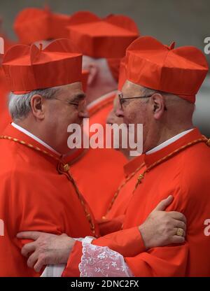 Pope Francis appoints new cardinal Jose Luis Lacunza Maestrojuan of Panama (Left) during a ceremony at the Vatican City, Vatican, Italy, on February 14, 2015. Pope Francis elevated 20 Roman Catholic bishops and archbishops to the rank of cardinal at a consistory ceremony in St. Peter's Basilica at the Vatican City, Vatican, Italy, on February 14, 2015. Fifteen of the new cardinals are under the age of 80 and known as 'cardinal electors.' Among those taking part in the ceremony at the Vatican's St Peter's Basilica was retired German Pope Benedict XVI. Photo by Eric Vandeville /ABACAPRESS.COM Stock Photo