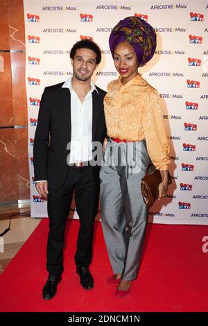 Alex Martin and Catia Mota Dacruz attending the Afrostream VoD opening party held at TF1 headquarters in Boulogne-Billancourt, near Paris, France, on March 4, 2014. Photo by Audrey Poree/ABACAPRESS.COM Stock Photo