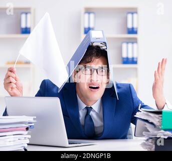 The businessman throwing white flag and giving up Stock Photo