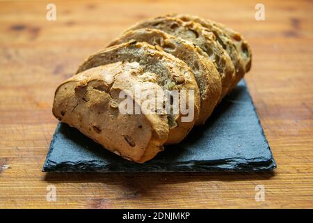 a delicious fresh bread with herb cream for the breakfast Stock Photo