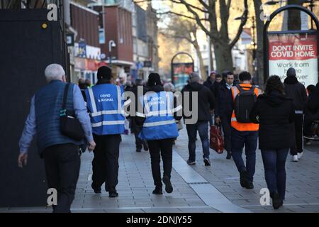 Peterborough, UK. 17th Dec, 2020. COVID Marshal's on patrol in Peterborough city centre today, after it was announced by Health Secretary Matt Hancock that Peterborough will be placed into the top level of Coronavirus restrictions, Tier 3, from Saturday December 19, 2020. Credit: Paul Marriott/Alamy Live News Stock Photo