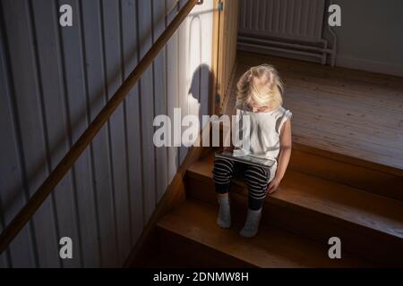 Girl using digital tablet Stock Photo