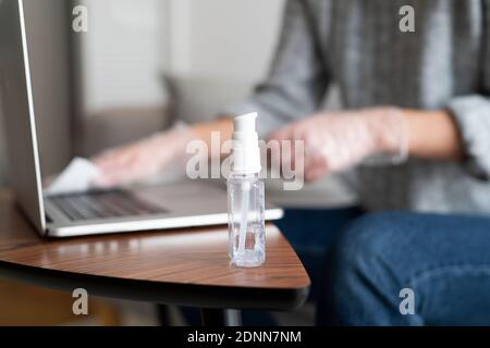 Hand sanitizer on desk Stock Photo