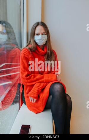 Woman wearing protective mask Stock Photo