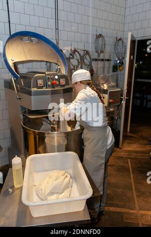 Female baker in bakery Stock Photo