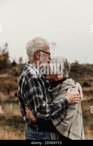Senior couple hugging Stock Photo