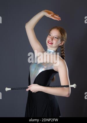 Redhead Teen Majorette Girl with Pigtails Posing in Studio Stock Photo