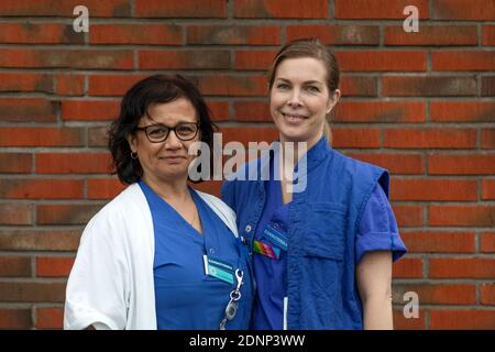 Female nurses looking at camera Stock Photo