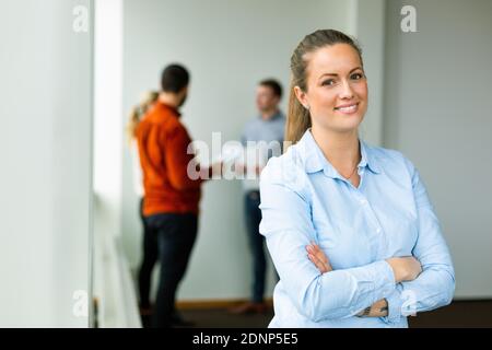 Smiling woman at work Stock Photo