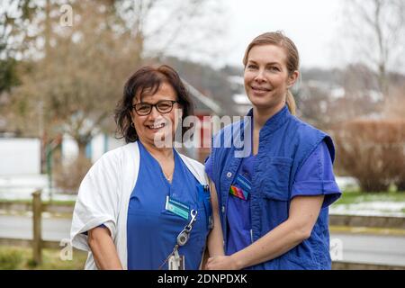Female nurses looking at camera Stock Photo
