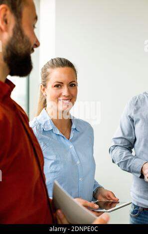 Smiling woman at work Stock Photo
