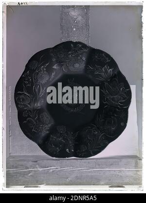 Wilhelm Weimar, fan-shaped plate with coat of arms in laurel wreath and flowers, glass negative, black and white negative process, total: height: 23.8 cm; width: 17.8 cm, numbered: top left : in black ink: 1148, plate, plate, flower ornaments, coat of arms shield, heraldic symbol, work of applied arts (ceramics), arts and crafts, applied arts, industrial design, wreath, garland Stock Photo