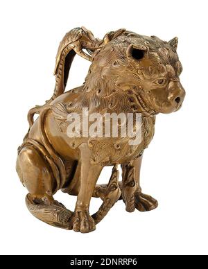 Löwen-Aquamanile, Bronze, Total: Height: 20 cm; Width: 14 cm; Heel height: 21,3 cm, Drinking and barware, Lion (predators), Animals, Medieval art, The shape of this watering vessel is unique. The sitting lion powerfully tramples down two dragons lambent against his chest, while a third bites his mane. Instead of the usual flap, the lion has an opening in his ear for pouring the water. When pouring it out, it does not flow out of the mouth but out of the nostrils. The dragon on its back served as a handle. Among the medieval bronze implements, aquamaniles in the shape of animals Stock Photo