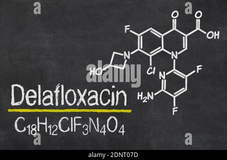 Blackboard with the chemical formula of Delafloxacin Stock Photo