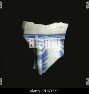 Fragment of a ribbed bowl, glass, pressed, blown into shape, Total: Height: 3.2 cm; Width: 2.7 cm, Drinking and tasting utensils, Burial objects, Early Imperial Period, Roman antiquity, The fragment with a rib is to be assigned to a bowl. On a white background, several blue stripes run through the shard, which lie across the rib and fade at the ends. For the production, threads were placed on the white vessel body and the whole thing was fused in a mould. Because of the elaborate manufacturing process and its fragility, glass was considered one of the luxury items of antiquity. Stock Photo