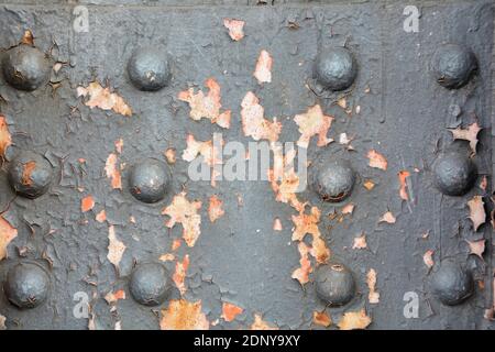 Surface of an old bridge with metal rivets Stock Photo