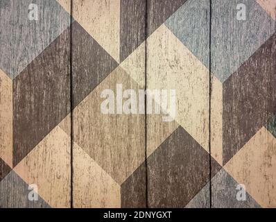 Aged dark brown wooden planks background with geometrical pattern closeup Stock Photo