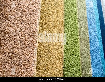 Background from colorful carpet samples in the store Stock Photo