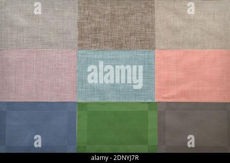 Background from different colorful pieces of cloth, closeup Stock Photo