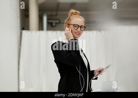 Businesswoman holding digital tablet Stock Photo