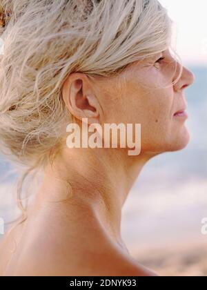 Mature woman looking away Stock Photo