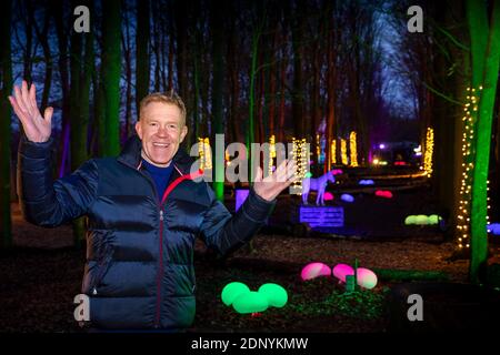 UK, Gloucestershire, Temple Guiting, Cotswold Farm Park, Conservation Area, BBC Countryfile presenter and farmer Adam Henson in Enchanted Light Trail Stock Photo