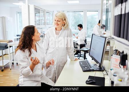 Women working in laboratory Stock Photo