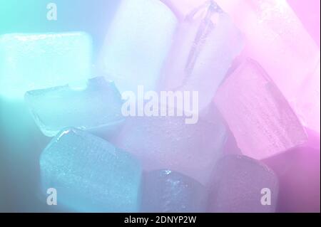 Stack of colorful ice cubes macro close up view Stock Photo