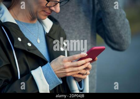 Woman checking cell phone Stock Photo