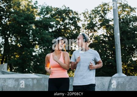 Couple jogging together Stock Photo