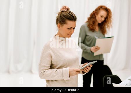 Woman using digital tablet Stock Photo