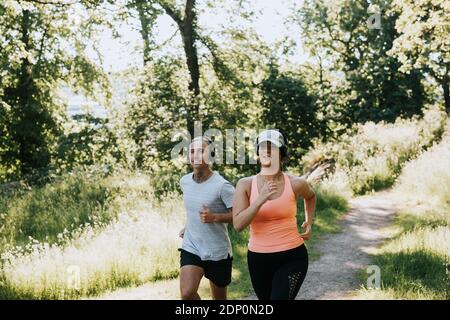 Couple jogging together Stock Photo