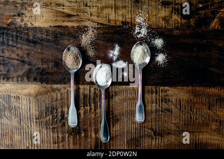Spices on spoons Stock Photo