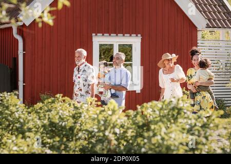 Three generation family walking together Stock Photo