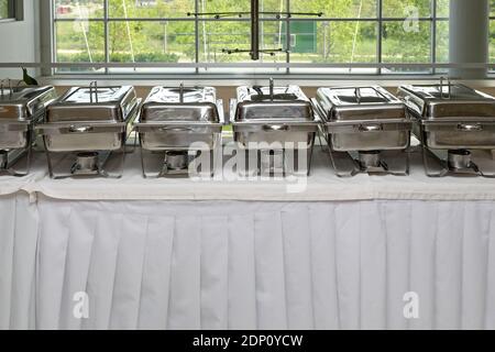 Food Warmers Trays Ready at Buffet Table Stock Photo