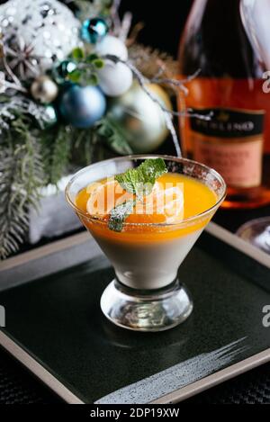 orange dessert on the new year's table Stock Photo