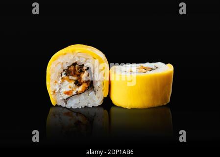 Japanese sushi rolls on a black background Stock Photo